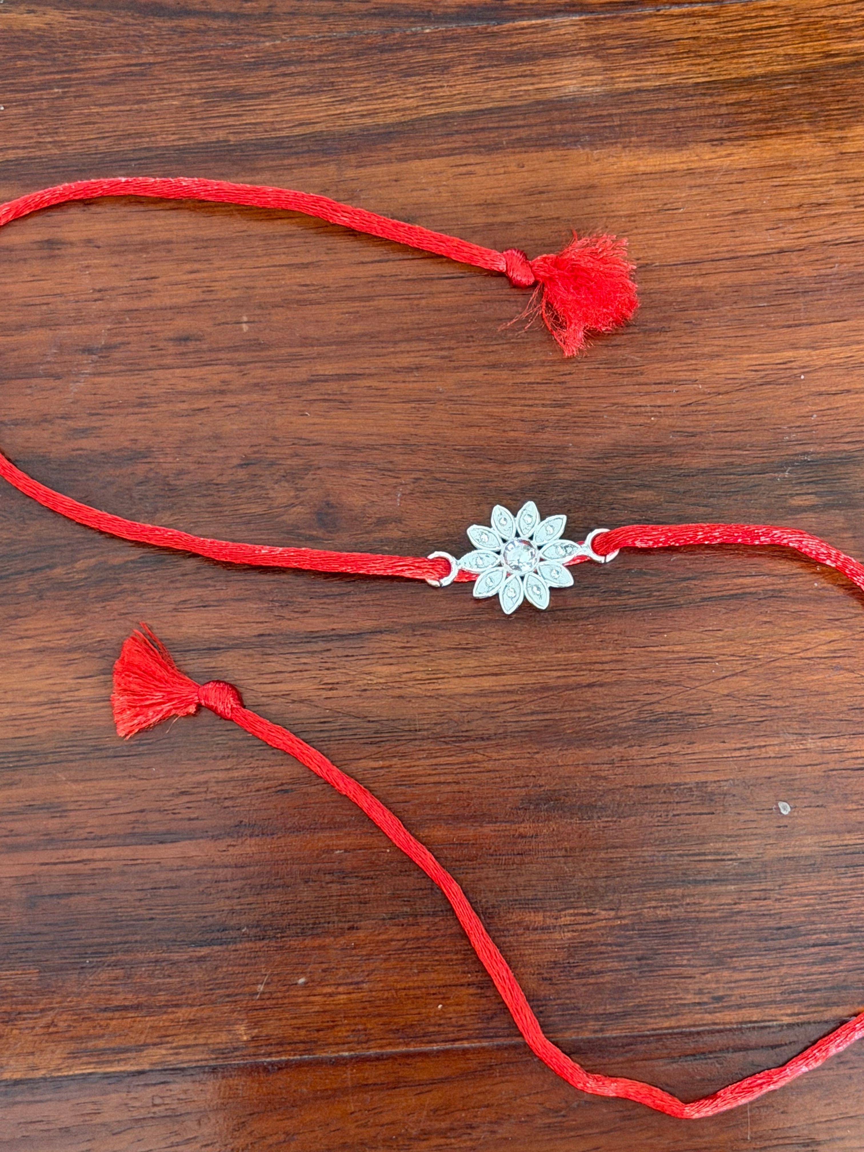 Pushp Divine Rakhi in Pure 92.5 Silver (Without Chain)