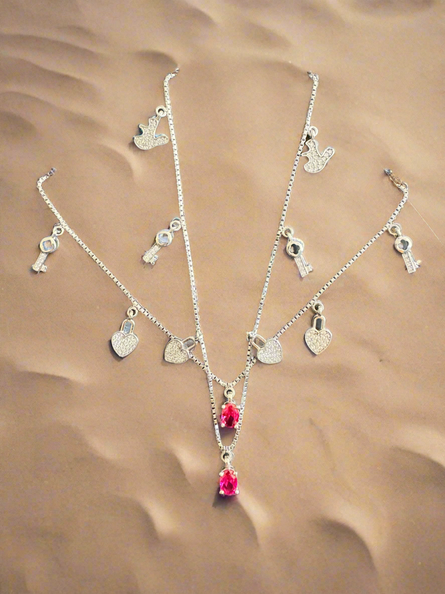 Pair of Silver Anklets with Charms