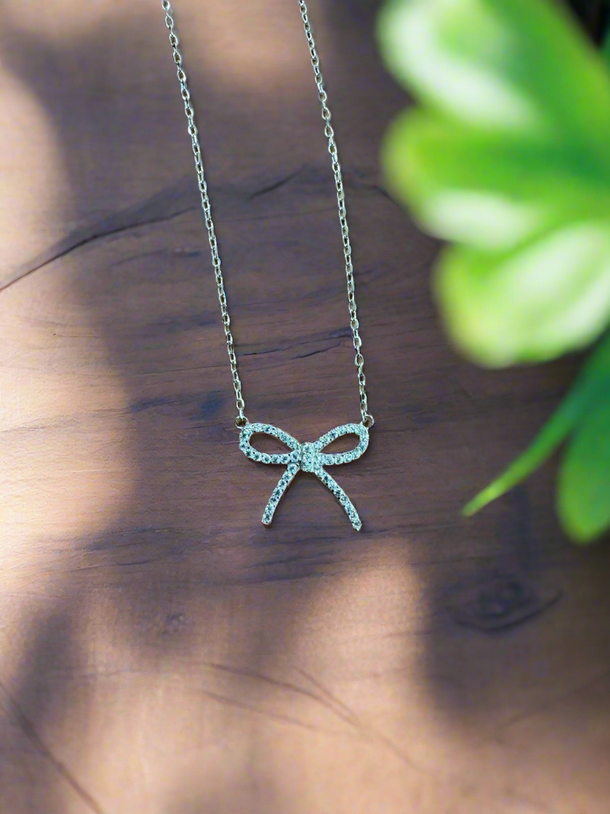 Silver Bow Pendant Minimalistic Necklace