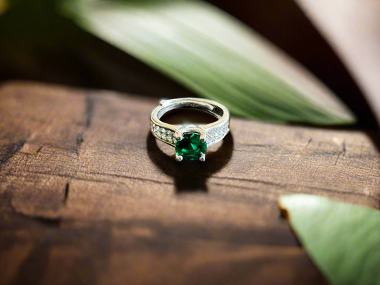 Silver Ring (size changing) with Green Round Gem