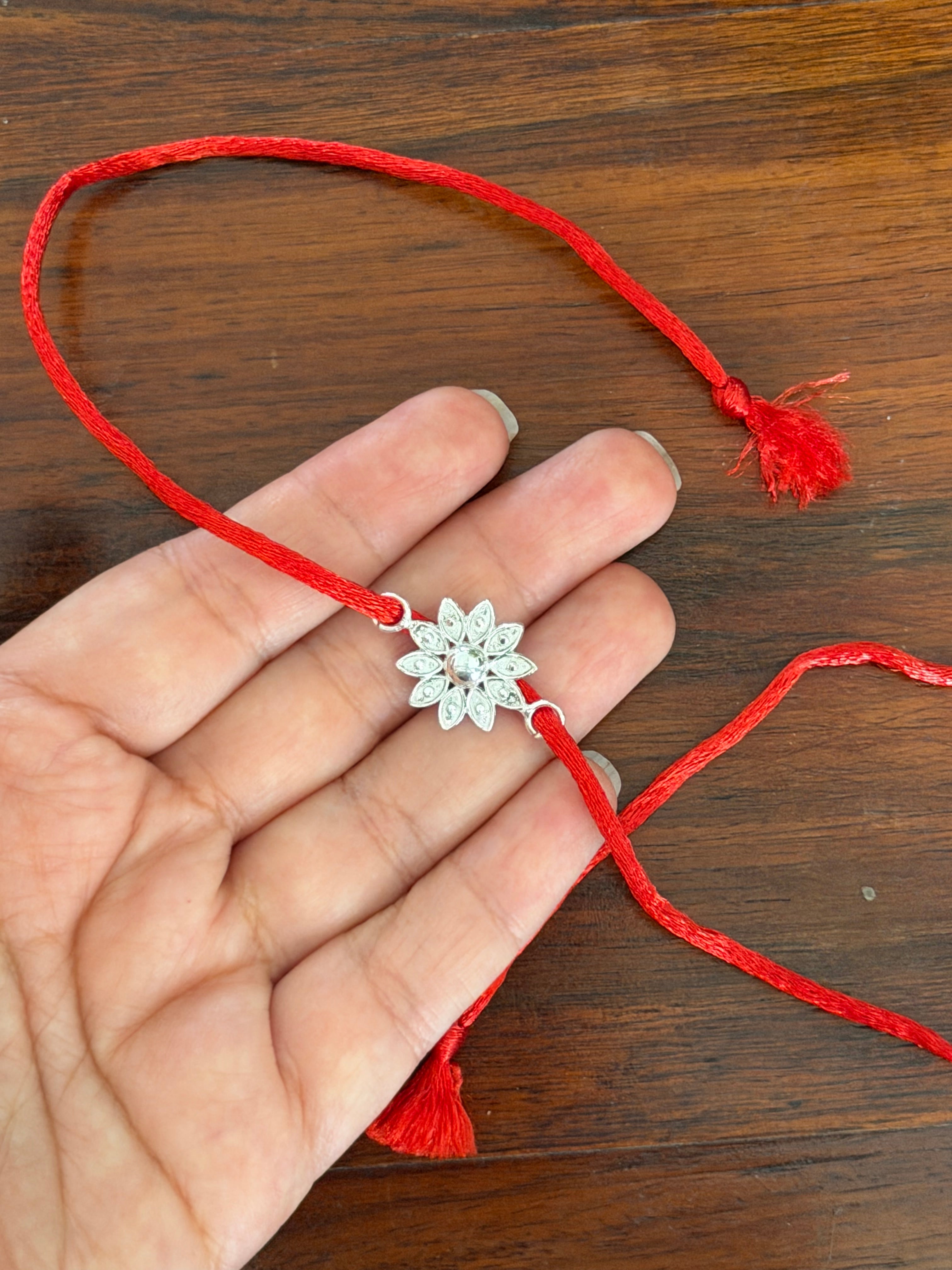 Pushp Divine Rakhi in Pure 92.5 Silver (Without Chain)