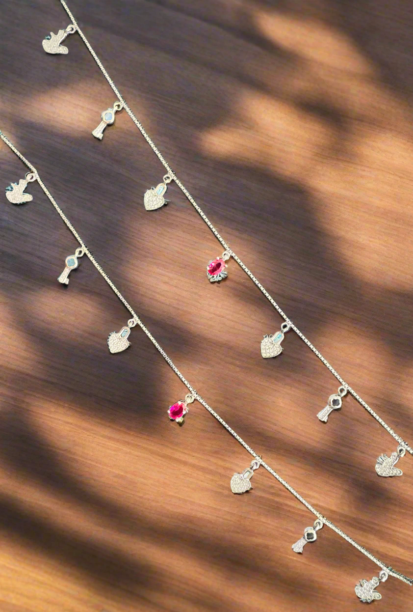 Pair of Silver Anklets with Charms