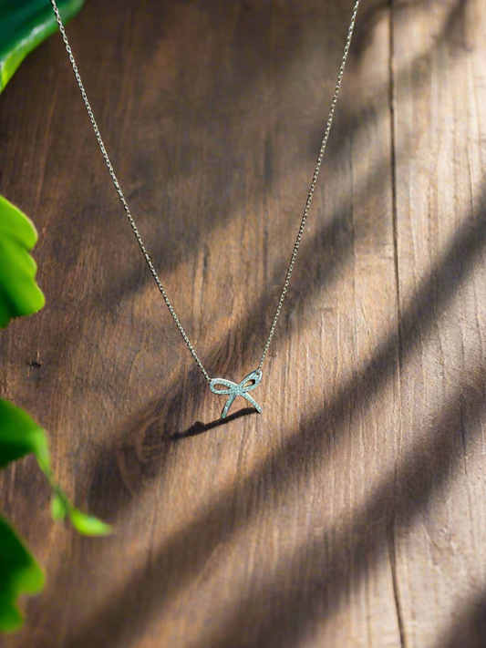 Silver Bow Pendant Minimalistic Necklace