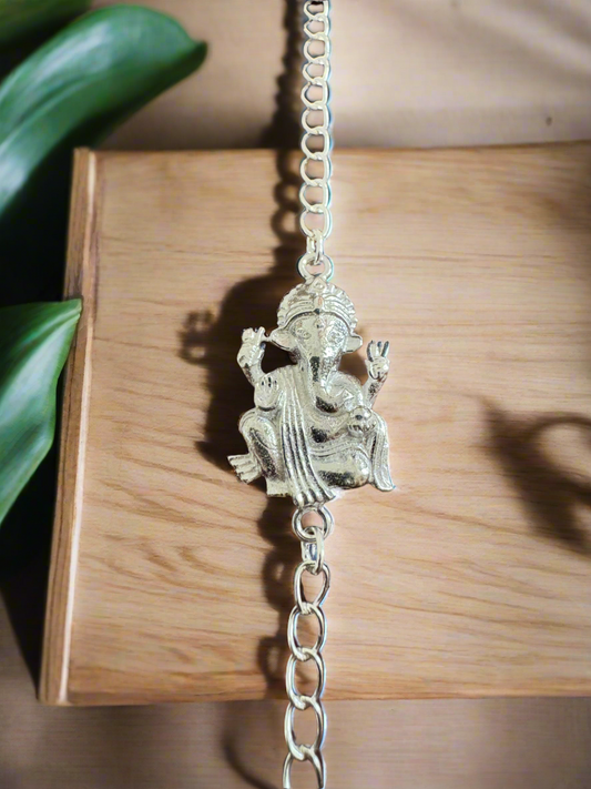 Vighnaharta Ganesha Handcrafted Rakhi in Pure 92.5 Silver