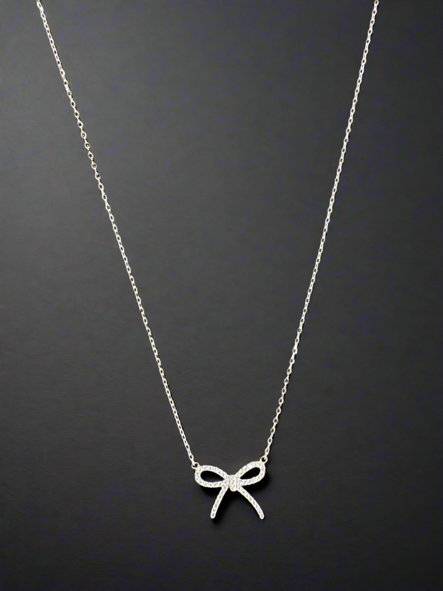 Silver Bow Pendant Minimalistic Necklace