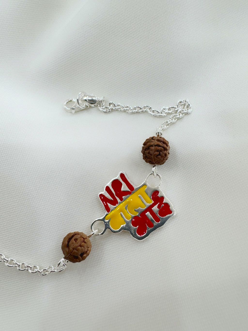 Elegant Silver Rakhi for NRI Bhai in 92.5 Sterling – Limited Edition
