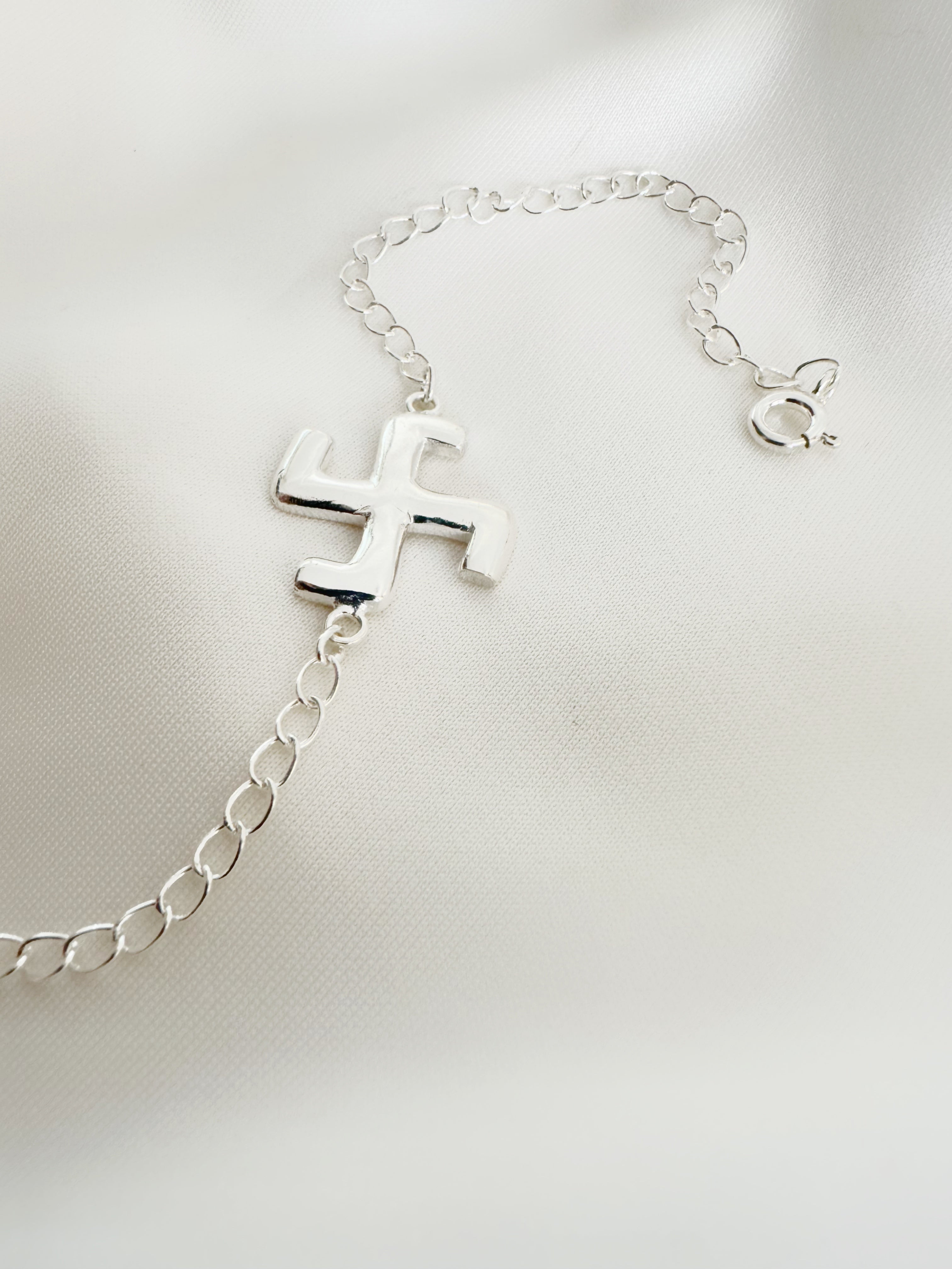Swastik Shuddhi Handcrafted Rakhi in Pure 92.5 Silver