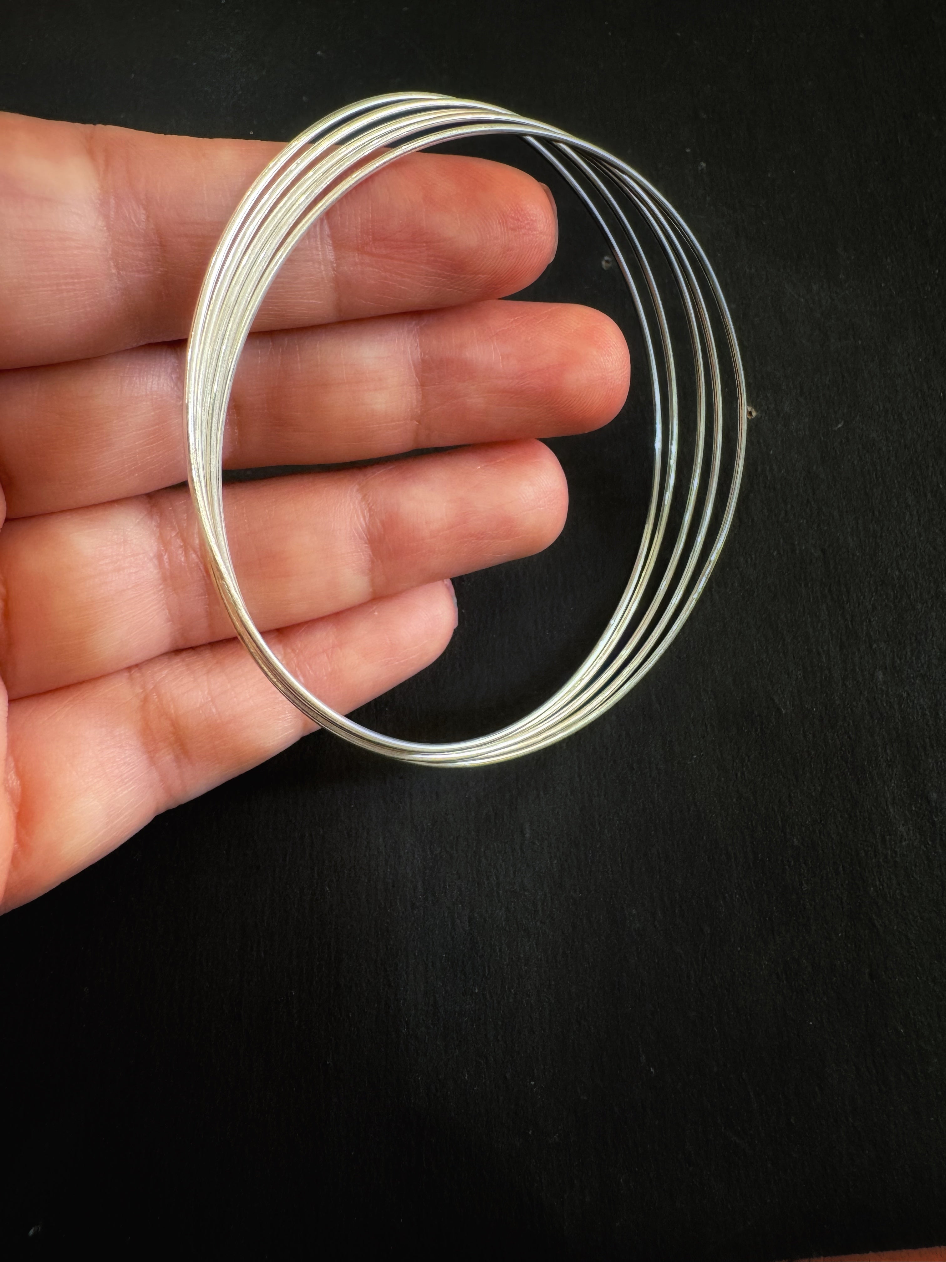 Set Of 5 Entangled Plain Sleek Bangles - 92.5 Silver
