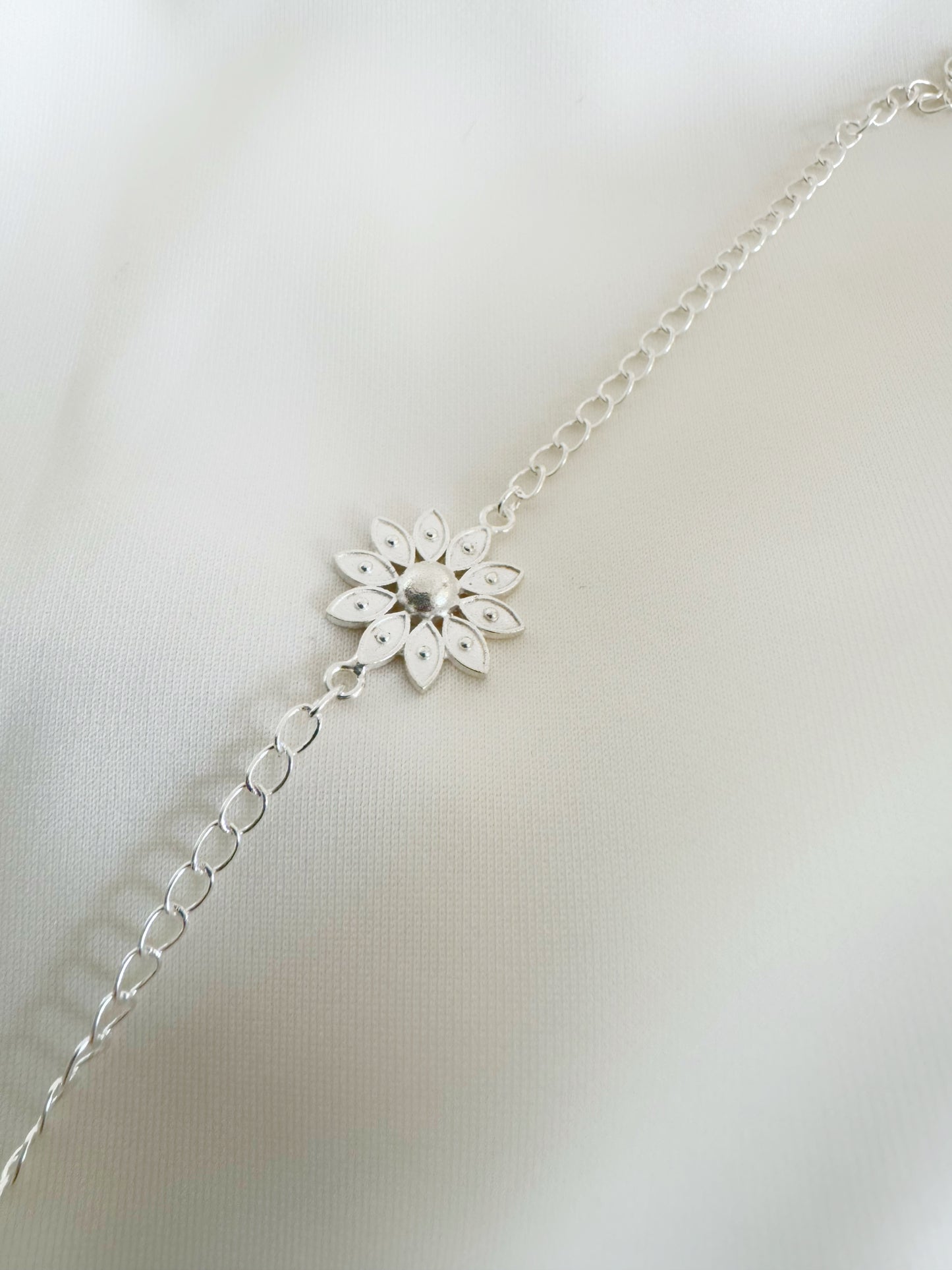 Pushp Divine Handcrafted Rakhi in Pure 92.5 Silver