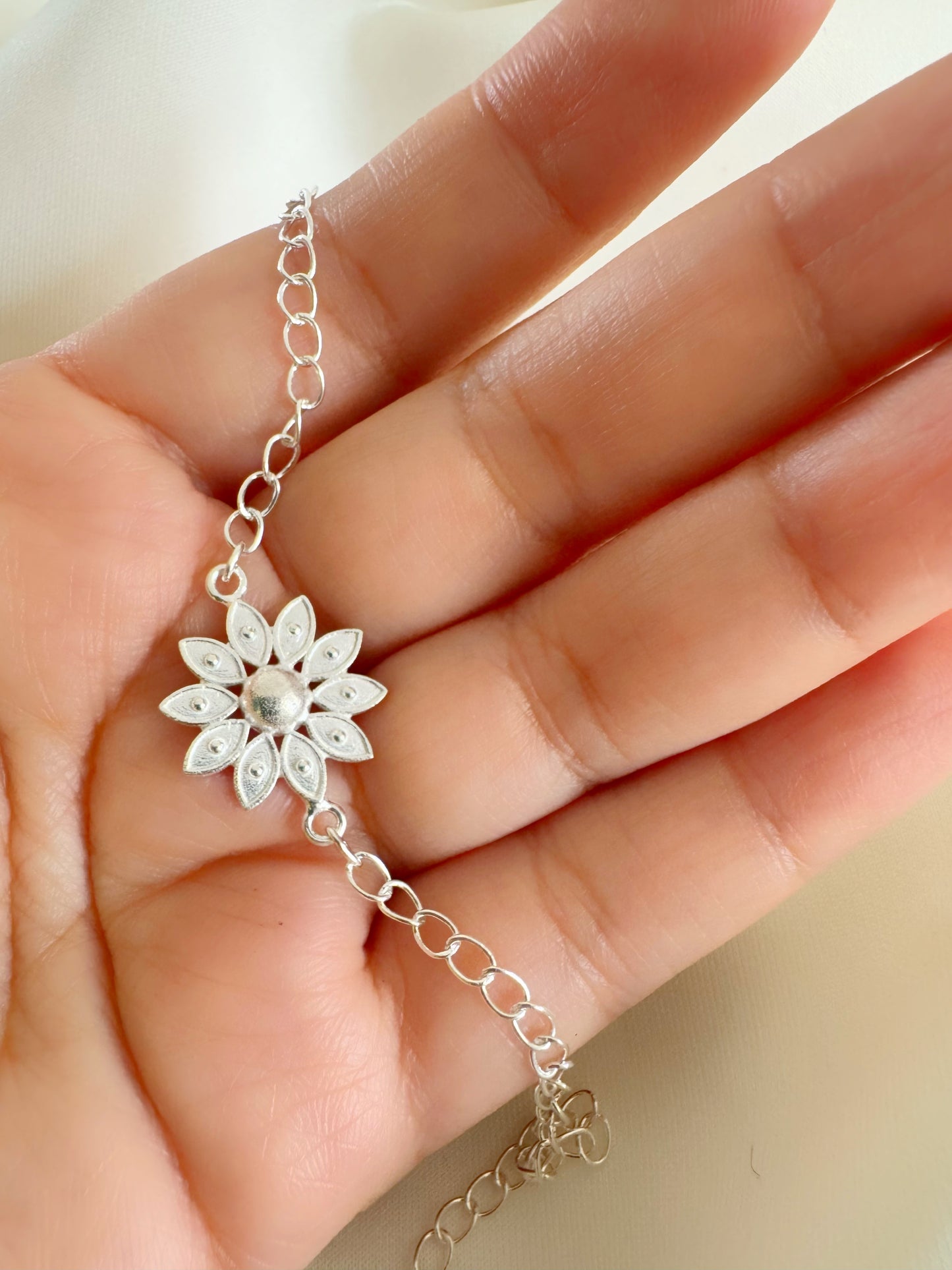 Pushp Divine Handcrafted Rakhi in Pure 92.5 Silver