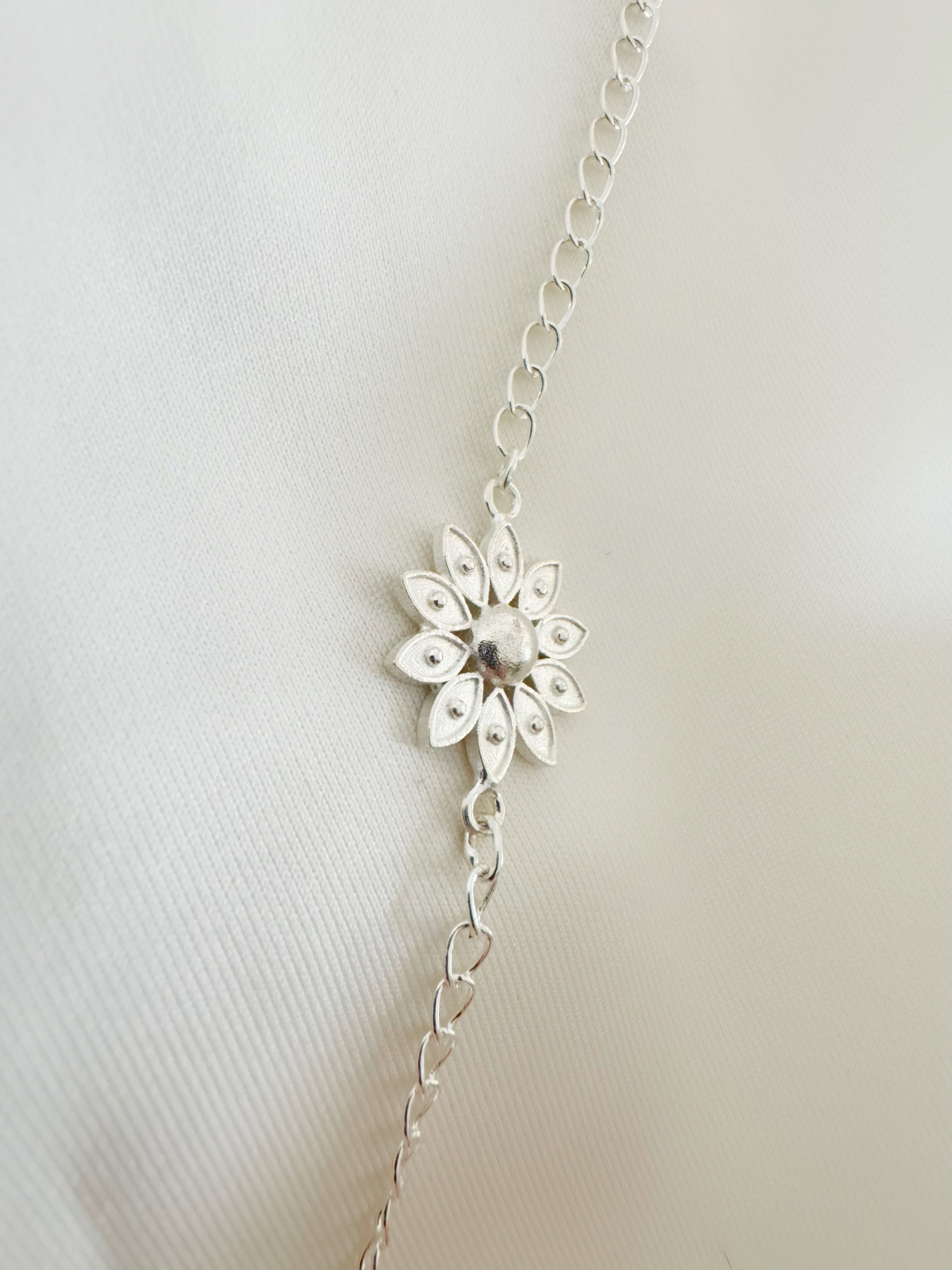 Pushp Divine Handcrafted Rakhi in Pure 92.5 Silver