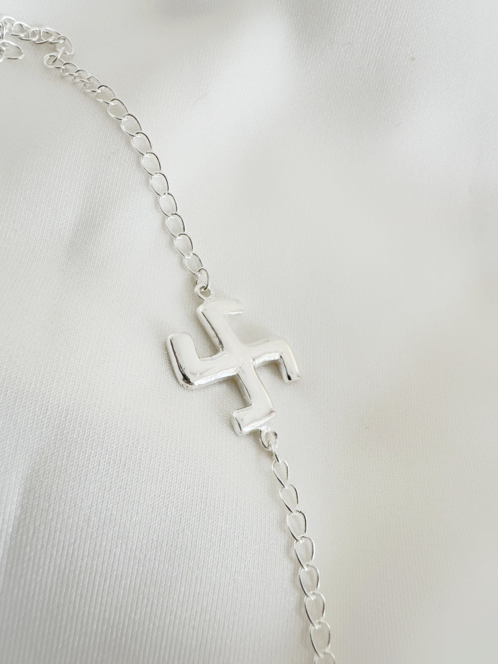 Swastik Shuddhi Handcrafted Rakhi in Pure 92.5 Silver