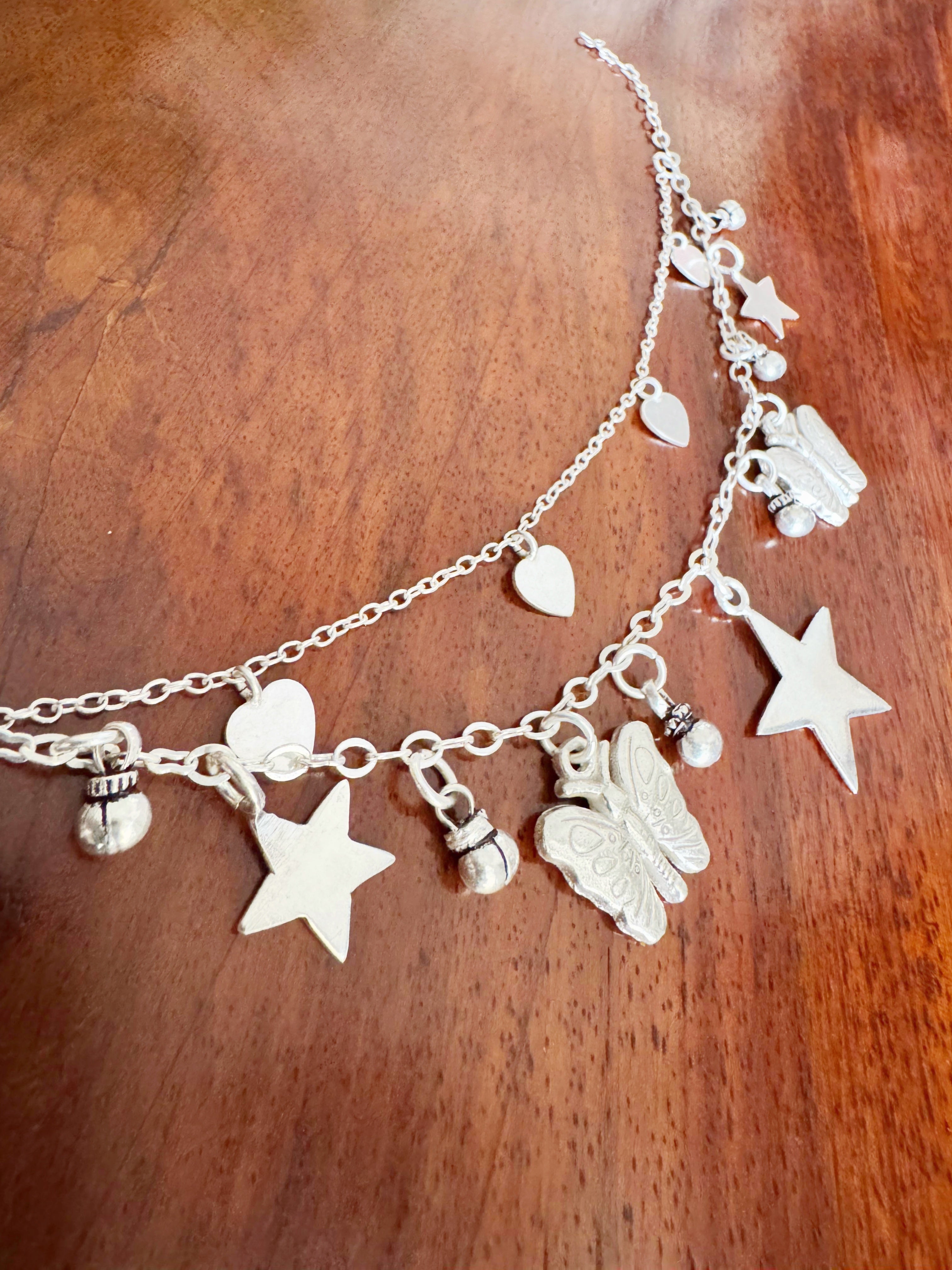 Sagarika – Butterfly And Star Charm Bracelet 92.5 Silver
