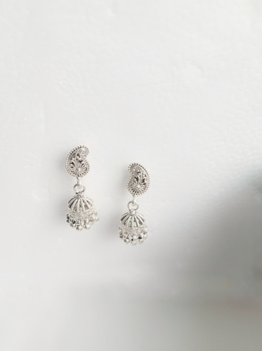 Paisley Charm Jhumkas 92.5 Silver Floral Jhumkis